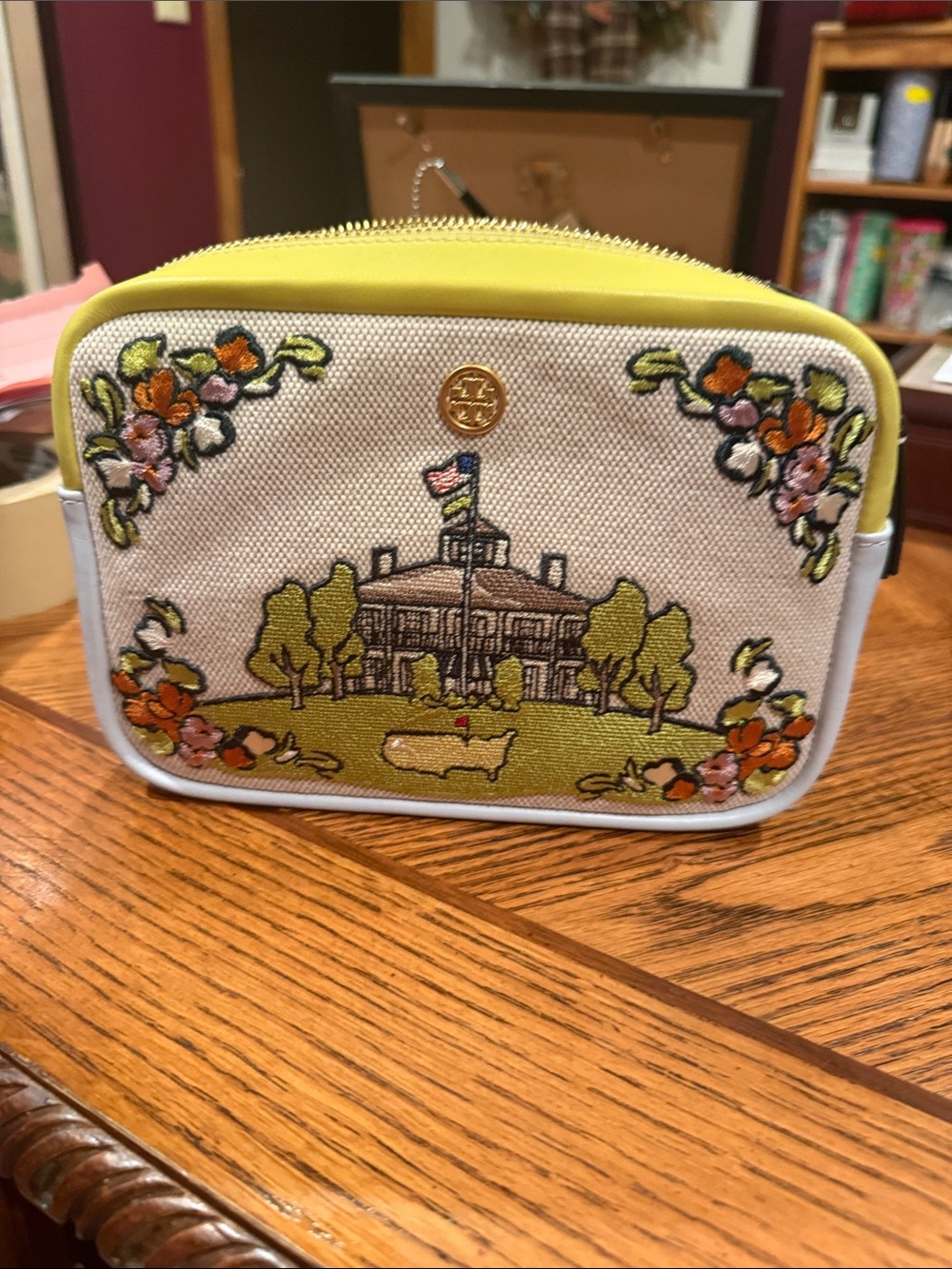 Tory Burch Yellow Trim Canvas Embroidered  Clubhouse Scene purse 
Augusta Nation